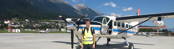 Pilot in front of a plane